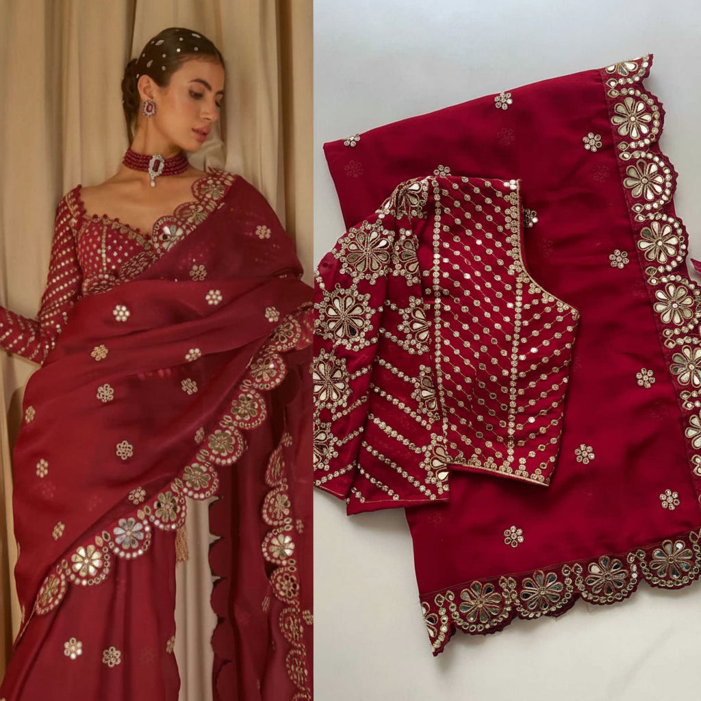 Red saree with gold embroidery displayed on a white background