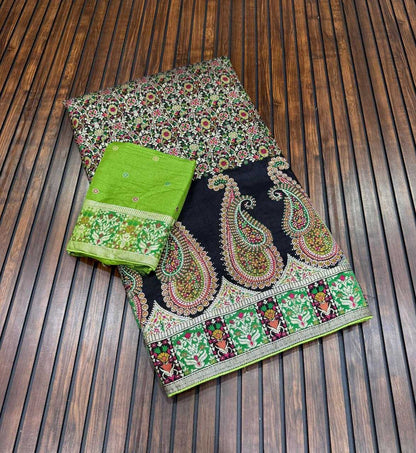 Decorative fabric with paisley patterns on a wooden surface
