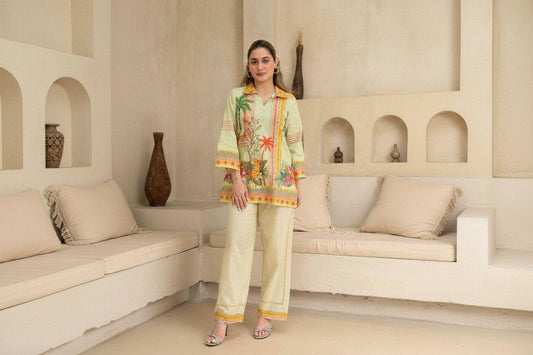 Woman wearing a colorful outfit in a living room setting with 'I Love' branding.