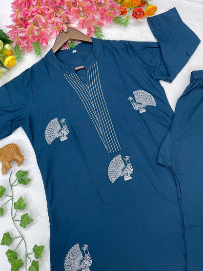 Blue outfit with white patterns on a white background with decorative elements.